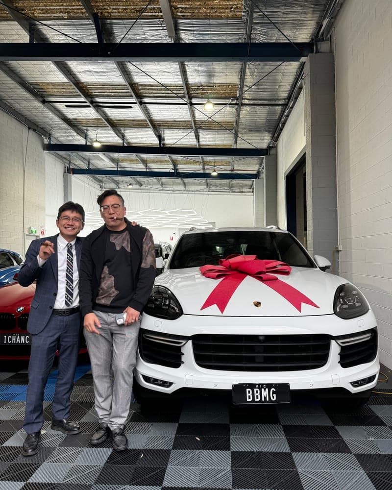 A customer picking up their car at Bayside Brothers Motors