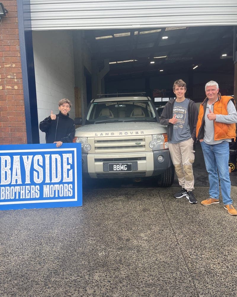 A customer picking up their car at Bayside Brothers Motors