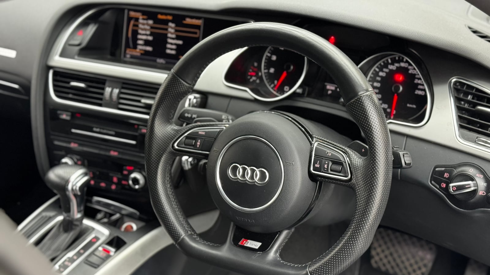 The Audi S-line interior of a car sold by Bayside Brothers Motors