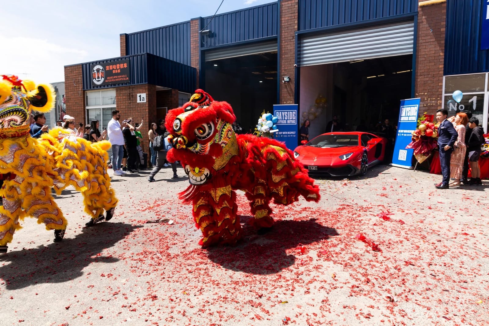 The lion dance at the Bayside Brothers Motors grand opening