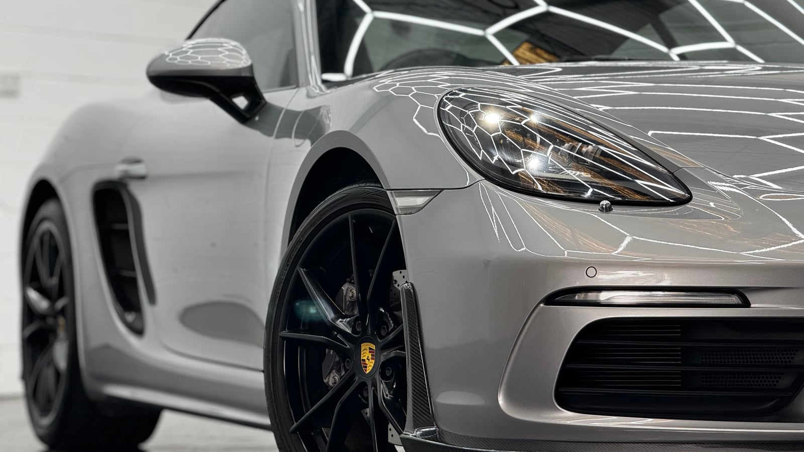 A Porsche 718 sold by Bayside Brothers Motors, detailed and ready for its new owner across Melbourne